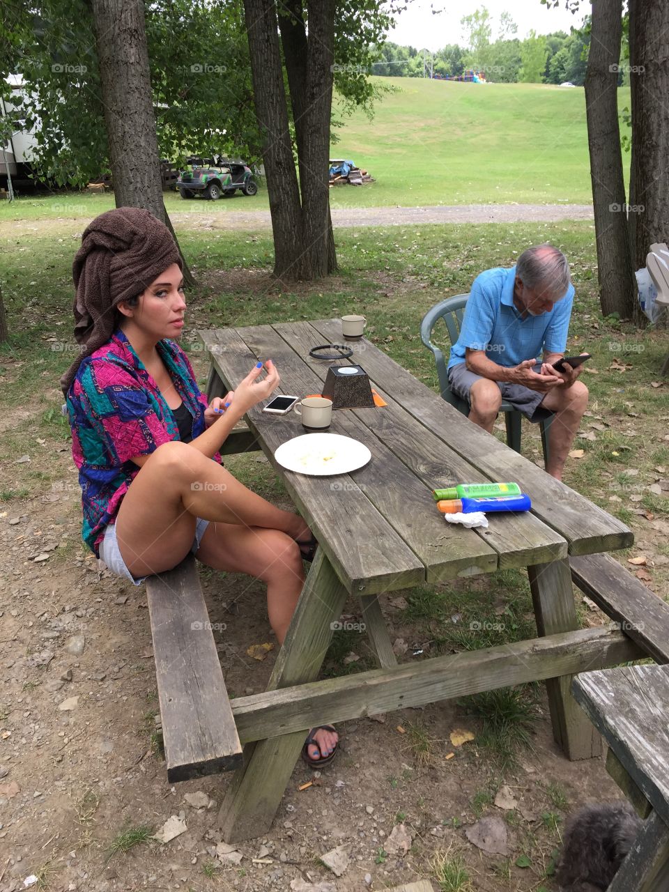 Woman and man at picnic table