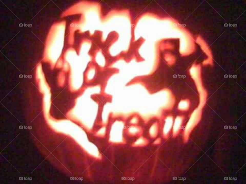 Trick or Treat!. My first pumpkin that I've ever carved with a stencil.