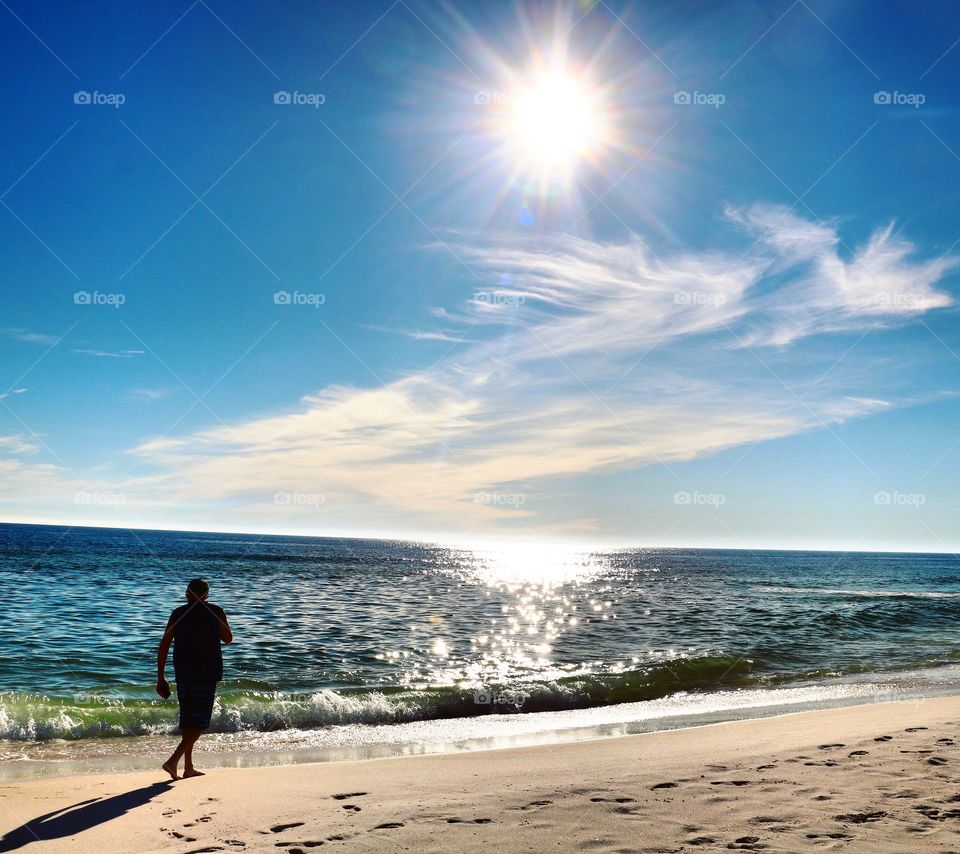 A stroll on the beach on such a beautiful day.