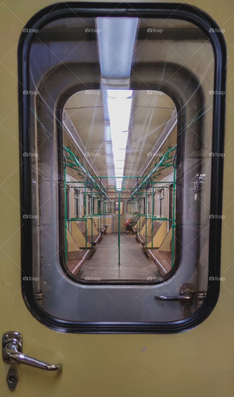 Window view of the empty subway train