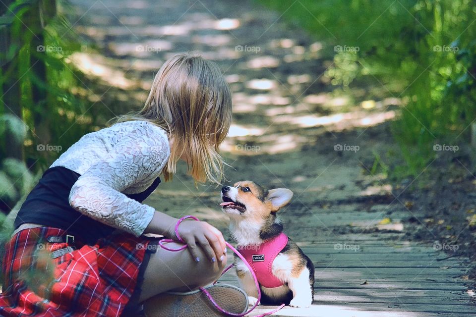 Love. Love between a girl and her puppy