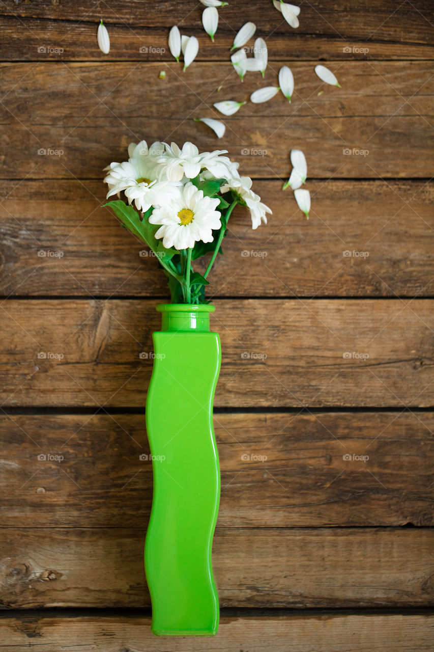 Flowers on wooden table