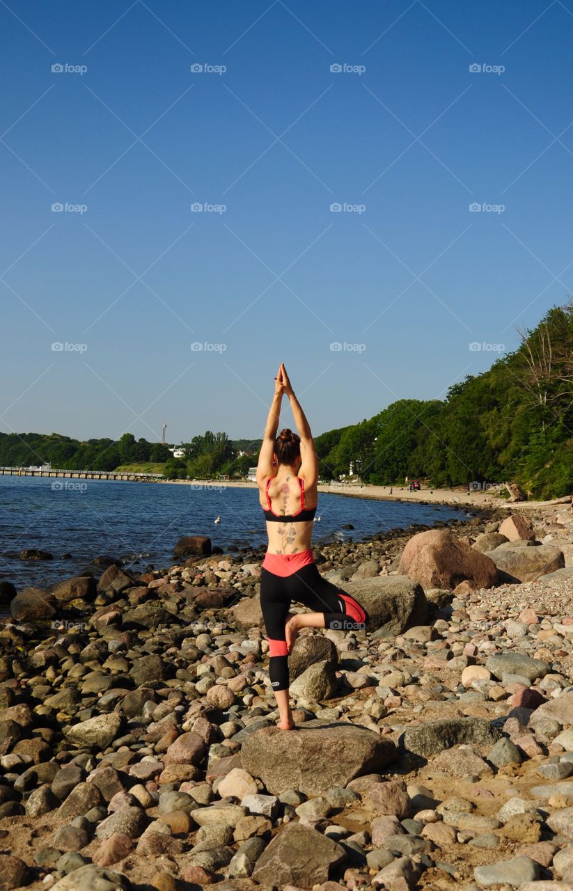 Yoga at the Baltic Sea coast in Poland 