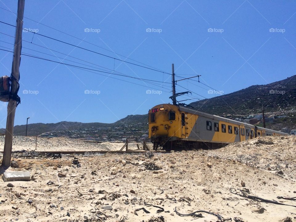 Train through sandy areas