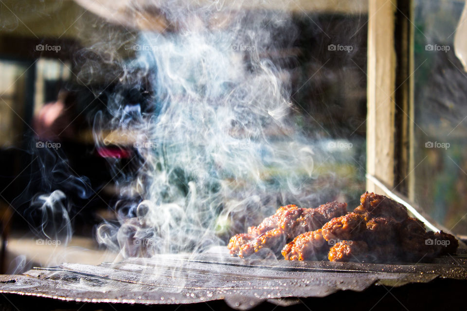 delicious patties on grill