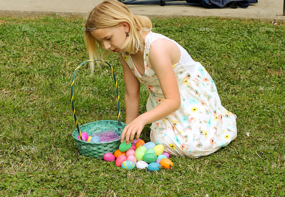 Easter eggs . little girl counting Easter eggs