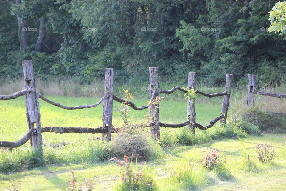 Old wooden fence at the farm. 