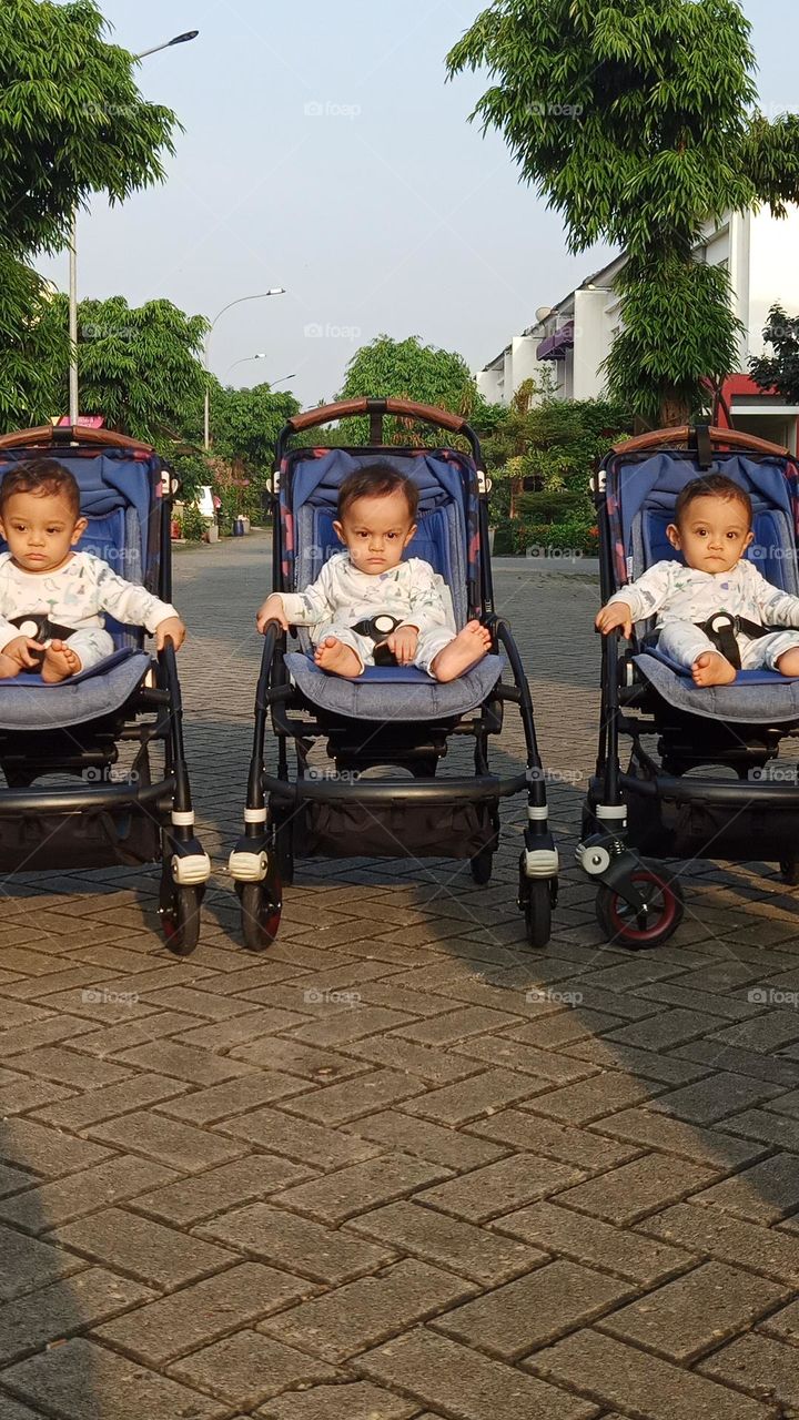 triplets on their strolles