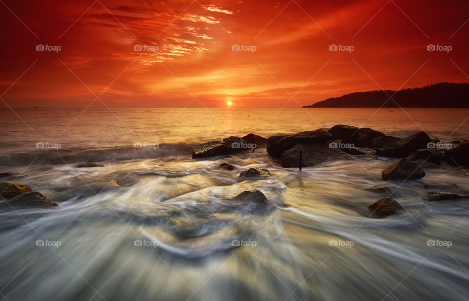Explore The Motion. Beautiful scenery of motion waves during golden sunset
