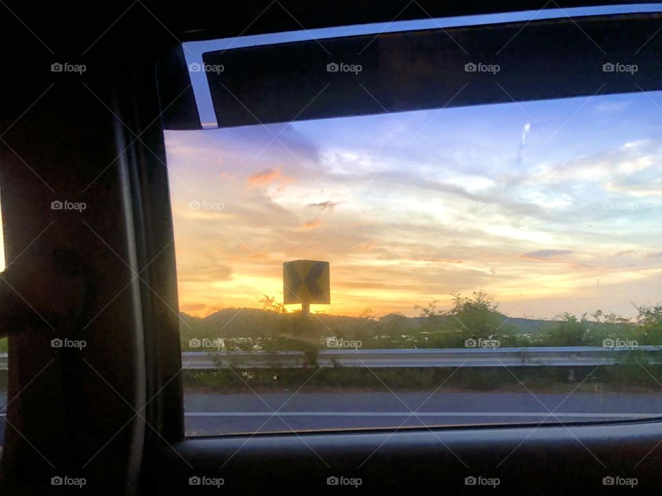 Sunset and sea view .When we were taking car back home.