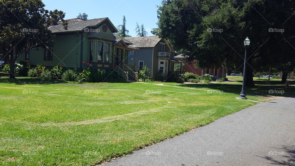 Inside history park in San Jose, CA. A row of houses  each once occupied by famous local people brought from all over the city to this park and preserved for all to enjoy.