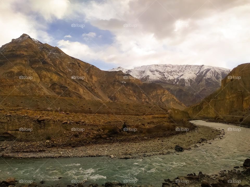 Amazing view of the mountains with the flowing twisted river