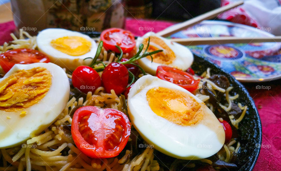 Noodles with eggs and tomatoes