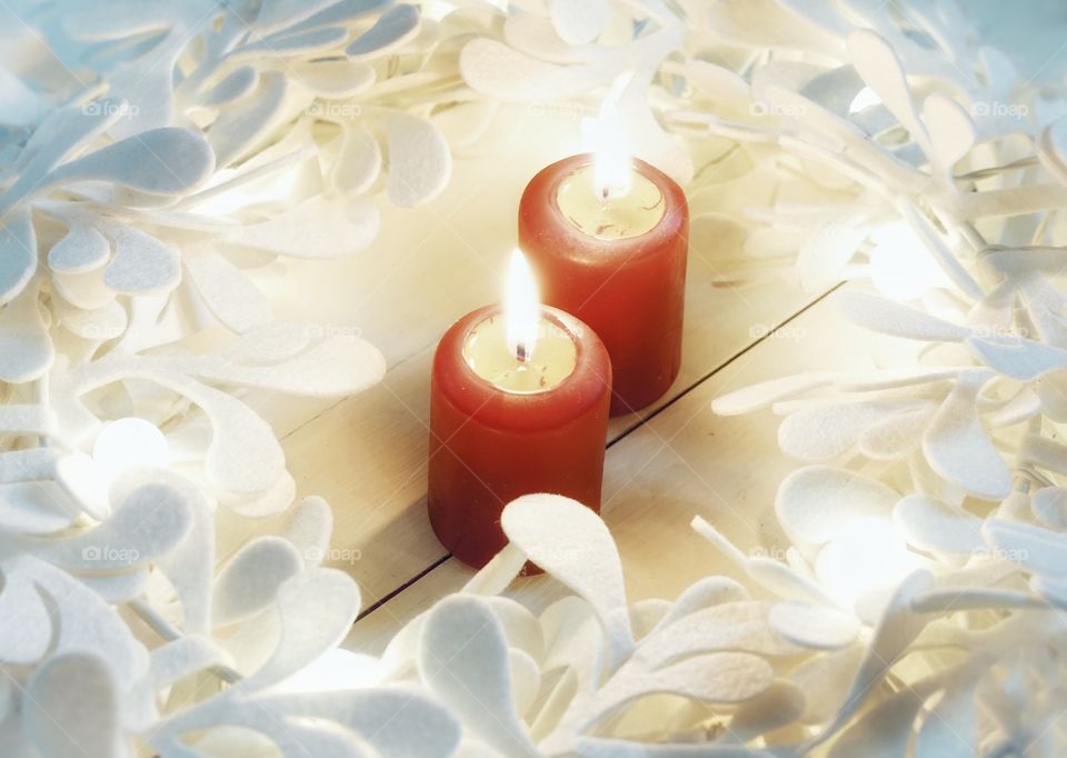 Candle red color flame close-up white background decoration celebration