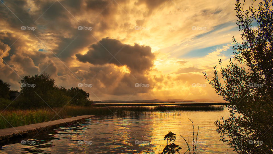 Dramatic sky and sunset at Corrib lake, Galway, Ireland