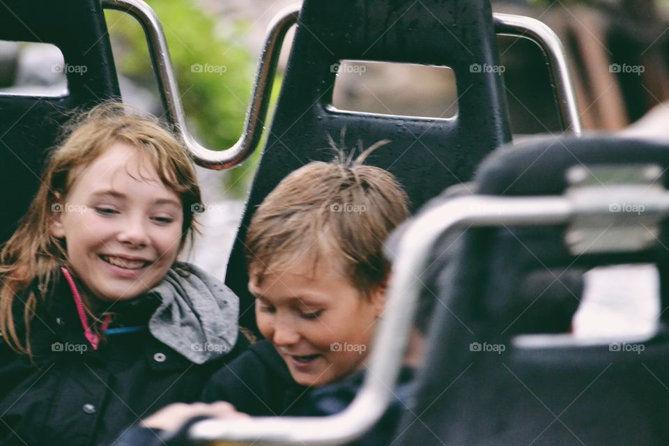 Children on the amusement ride