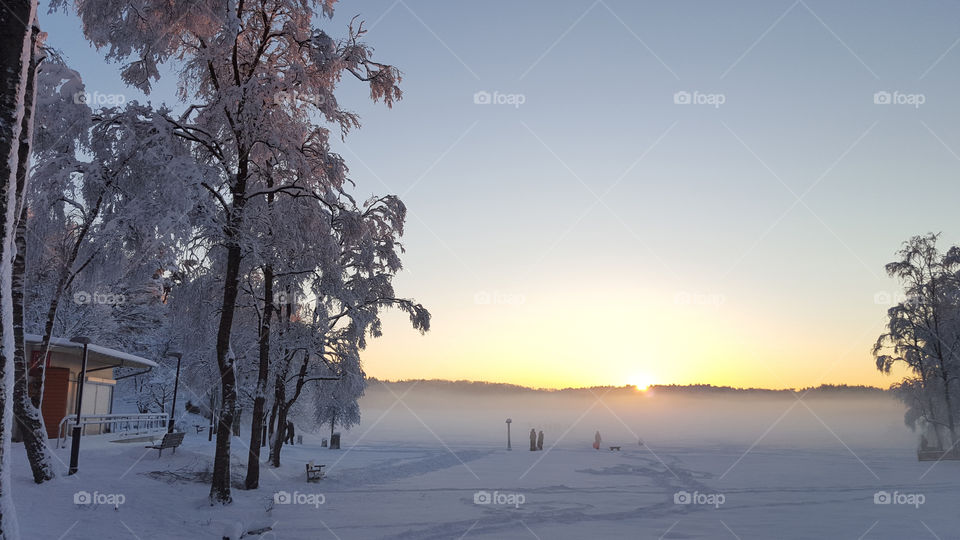 Winter - sunset at the lake - snow mist - vinter solnedgång snö sjö