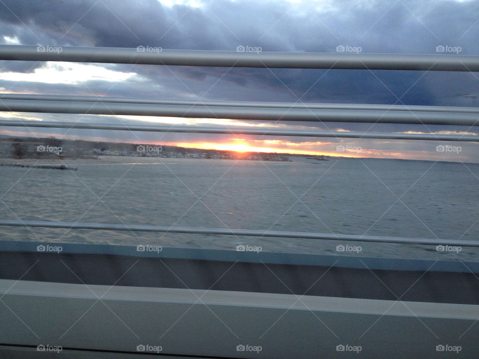 sunset water sea cloudy by michaella