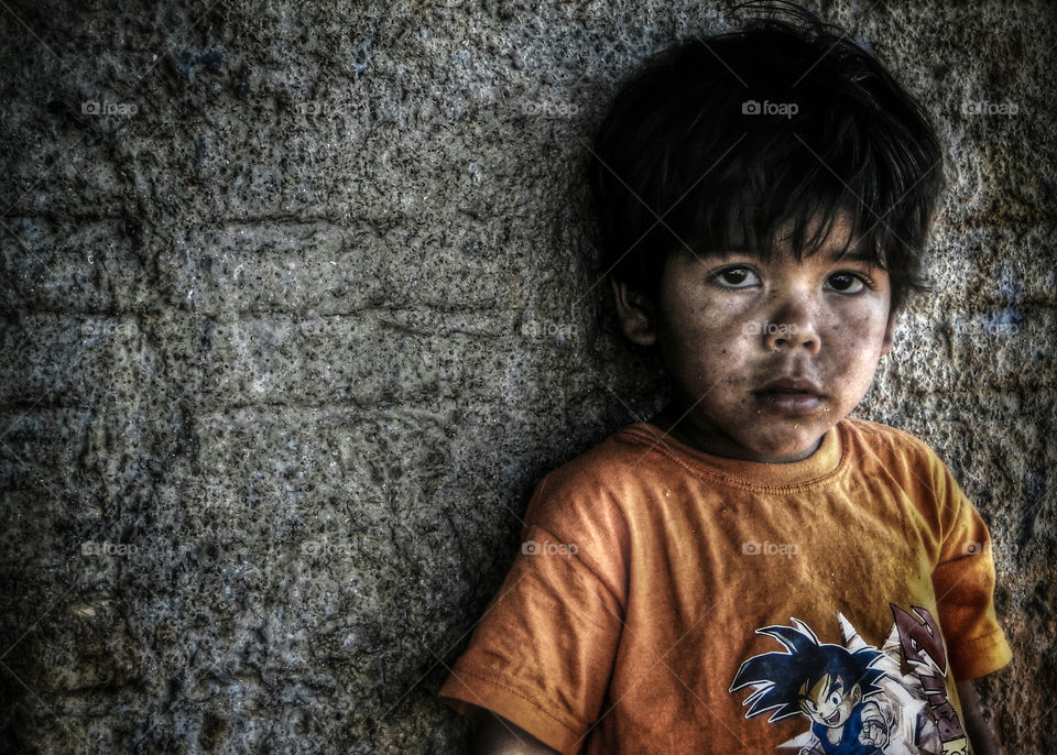 Portrait of boy with messy face