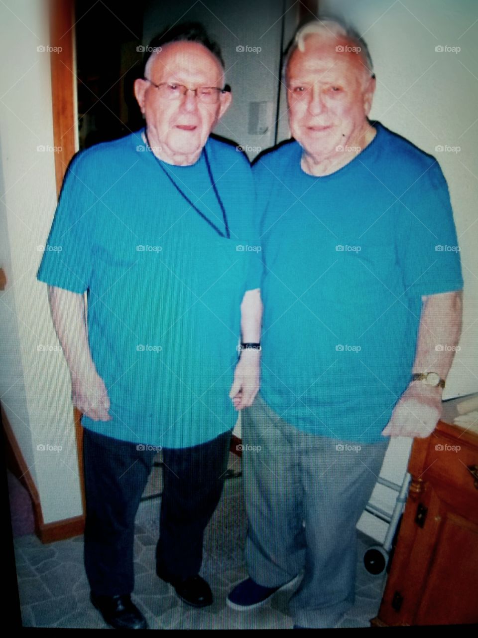 Men in blue, two Grandfathers.