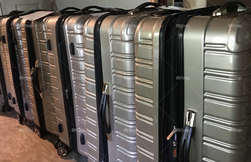 Silver suitcases all lined up