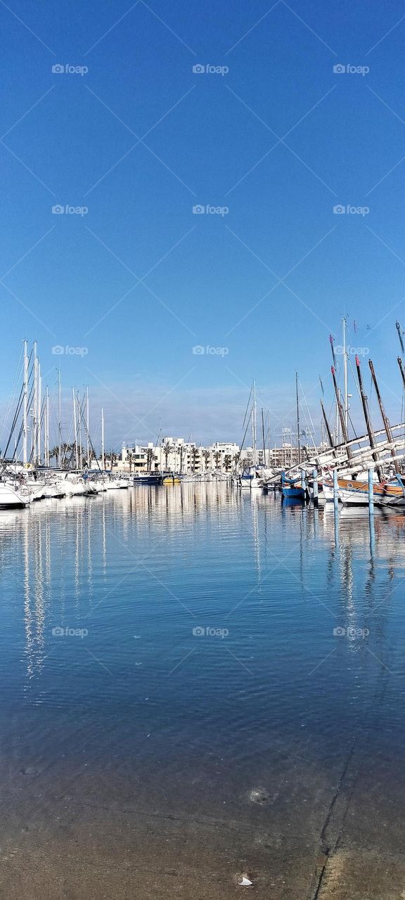 Simetry, boats and reflections