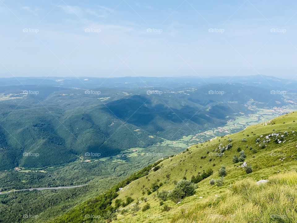 Scenic view of the green hills against blue sky in our summer vacation in Slovenia, Europe trip.