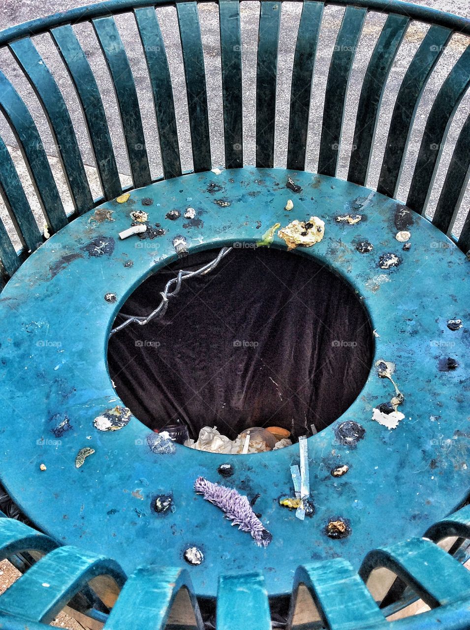 Trashed. Public Garbage Can