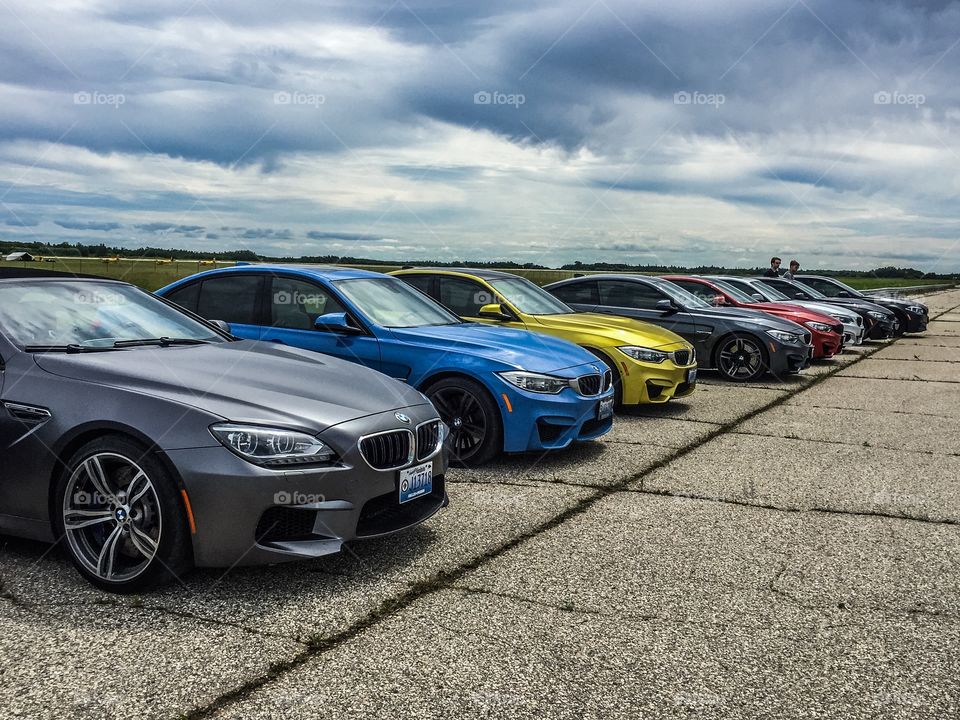 BMW's all in a row at the race track 