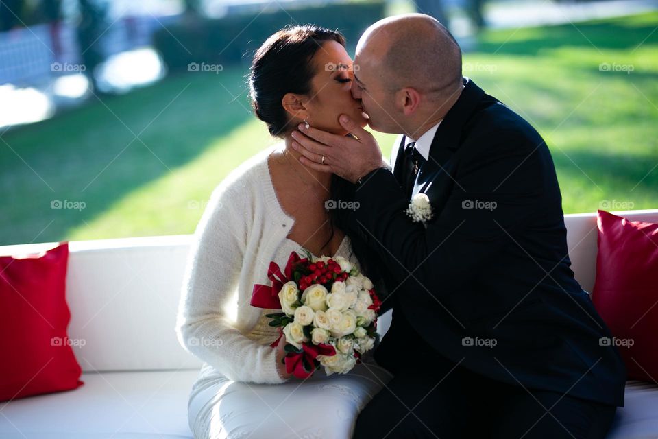 bride and groom kiss