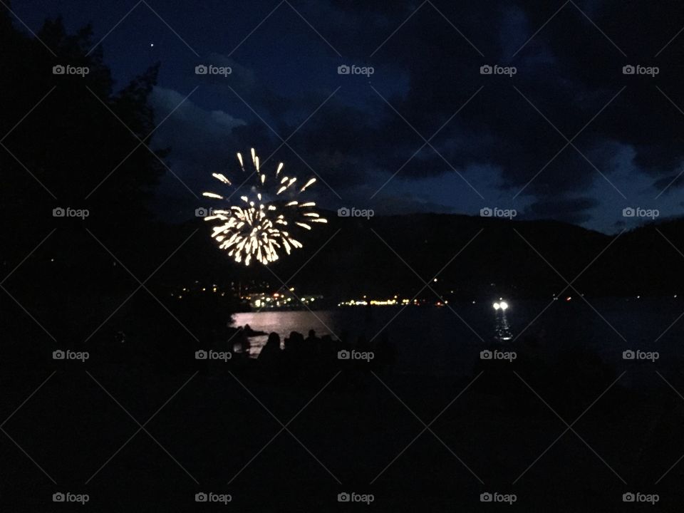 Fireworks over the lake in Nelson, BC.  Dark, chilly night but the fantastic view was worth it. 