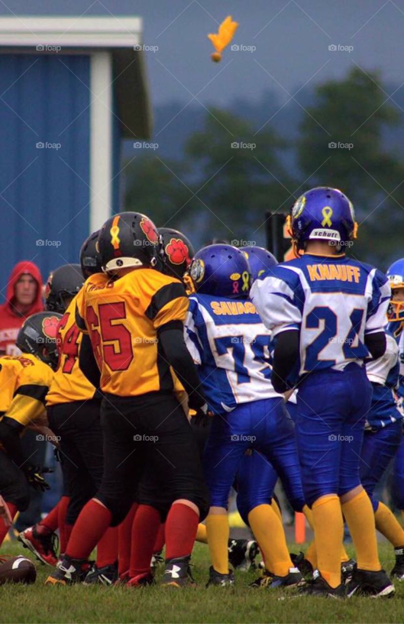 Flag on the Play. A flag thrown during a youth football game. 