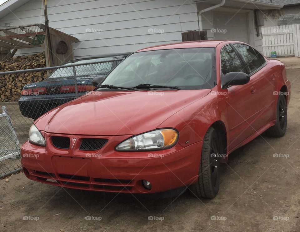 This is my new, but used, beautiful red 2005 Pontiac Grand Am, not a scratch on her and got her for a steal of a deal