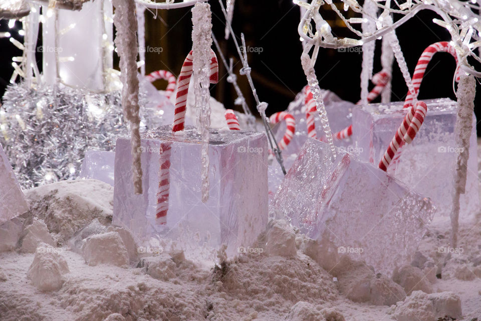 Christmas decoration, snow , ice , red and white candy canes 