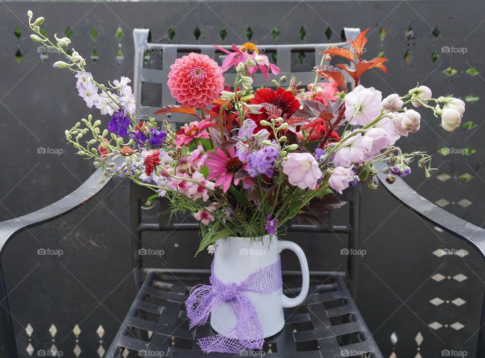 Cut flowers in a vase (jug)