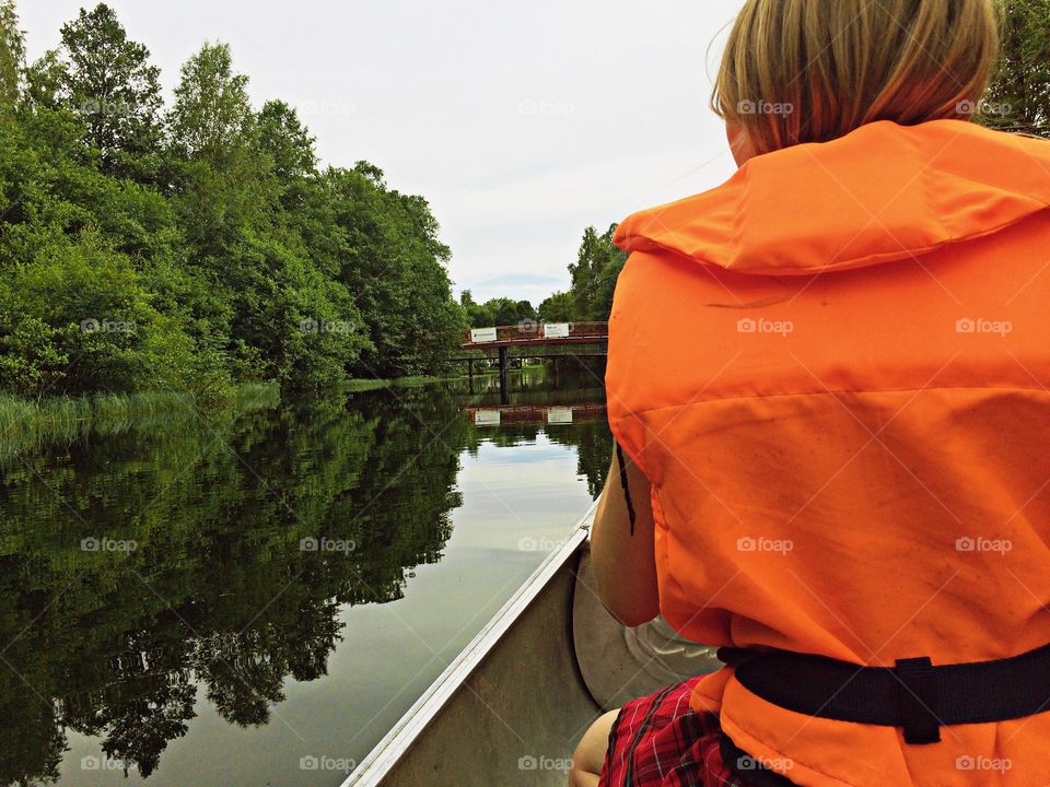 Canoe. Canoeing down the river