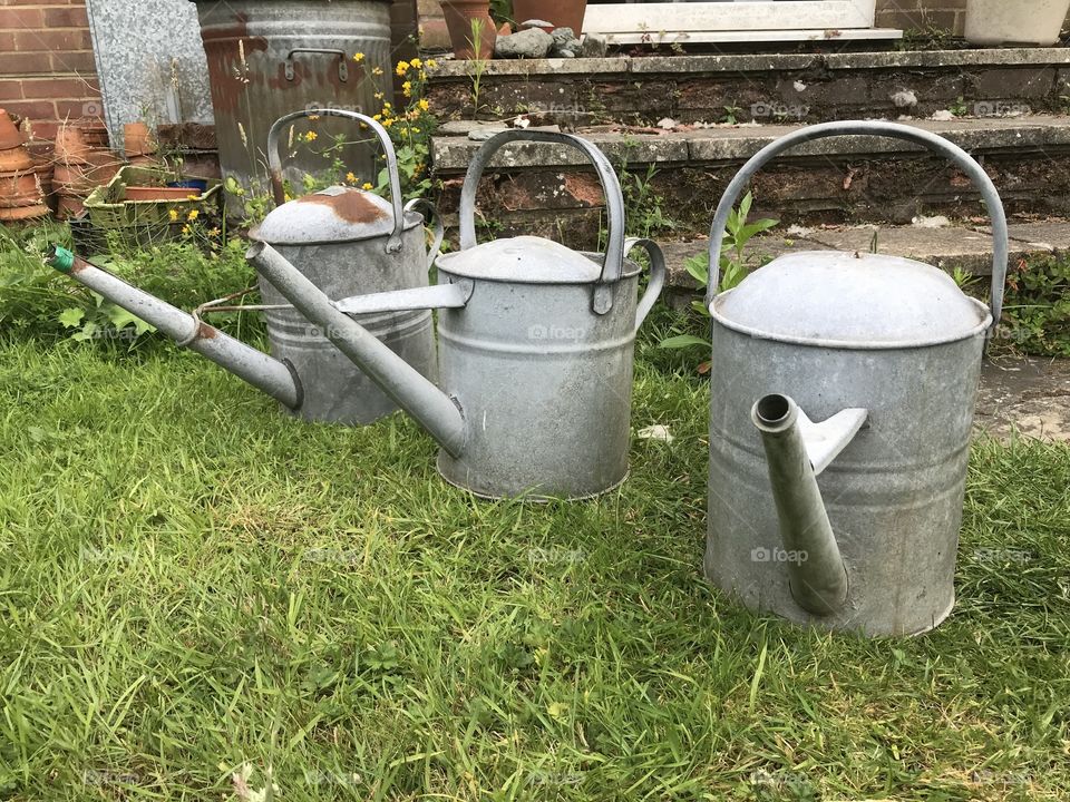 Watering-can trio