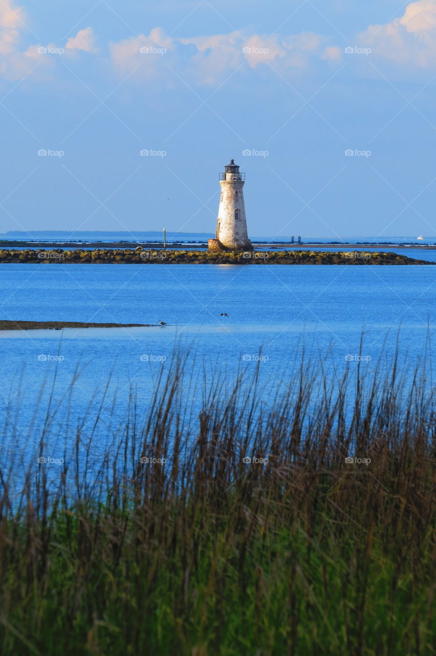 Lighthouse In The Bay 