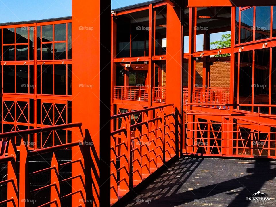 Steel beams, rods, and rails along with windows.