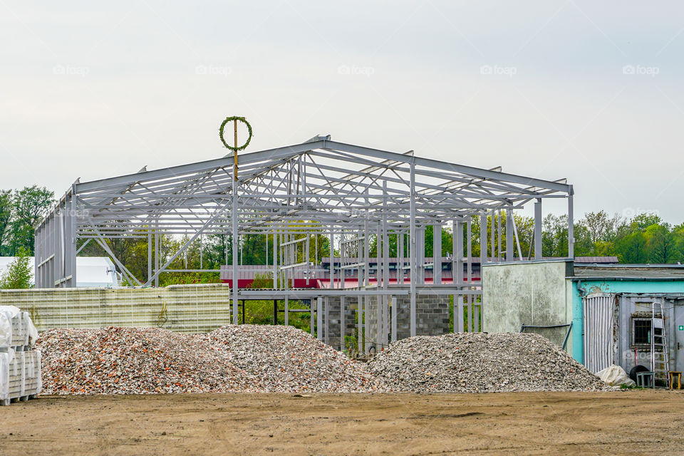 the steel frame of a new factory building under construction