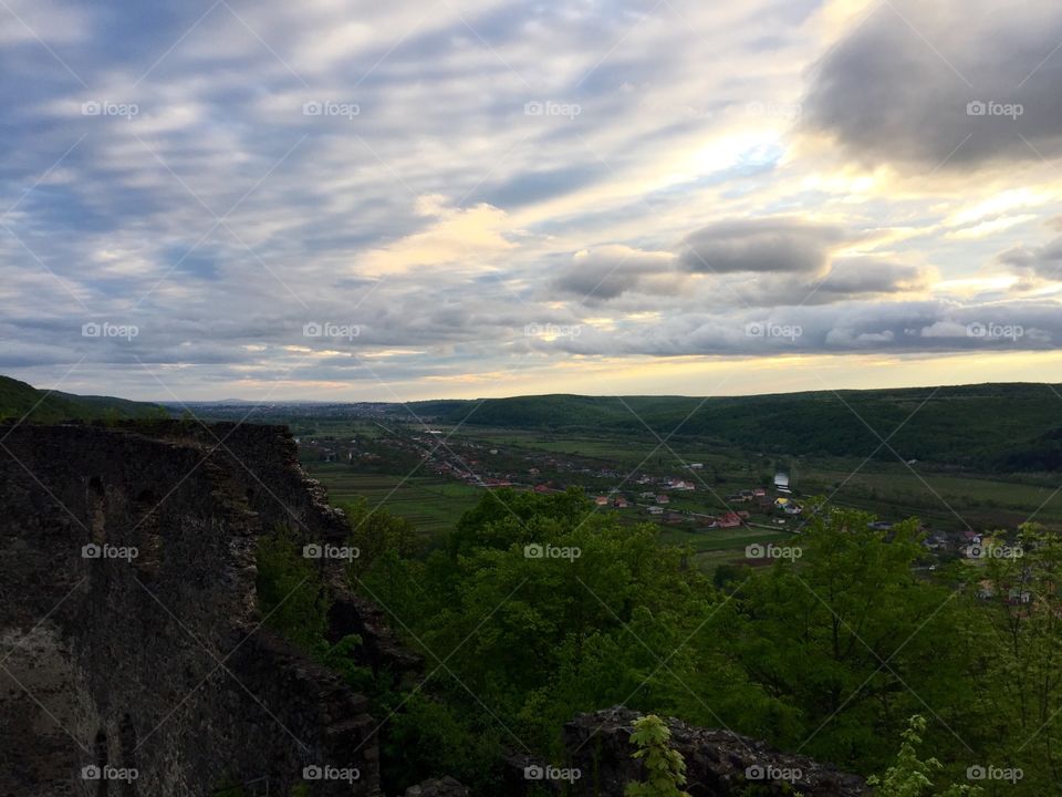 Sunset over ruins of an old castle in Ukraine