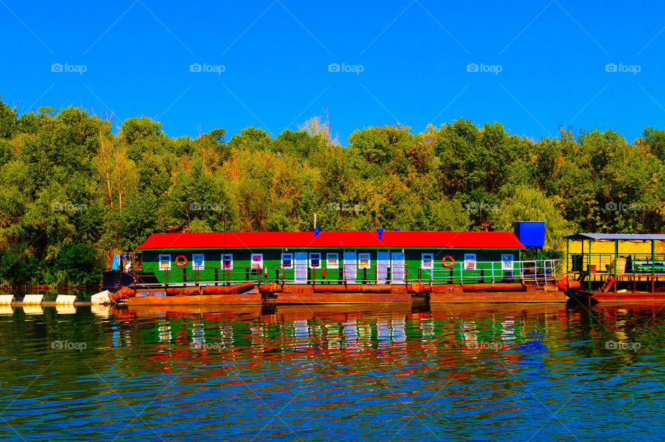 Floating hotel by the river.