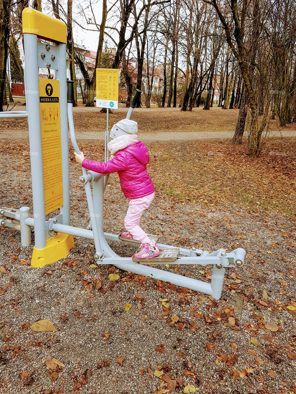 Small girl exercising