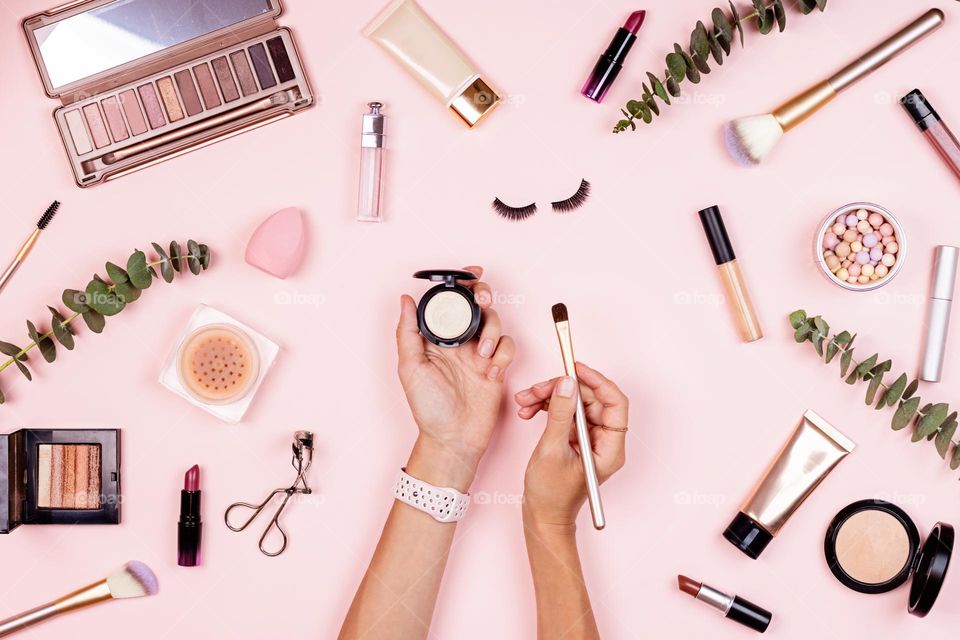 Beauty products flat lay on pink background 