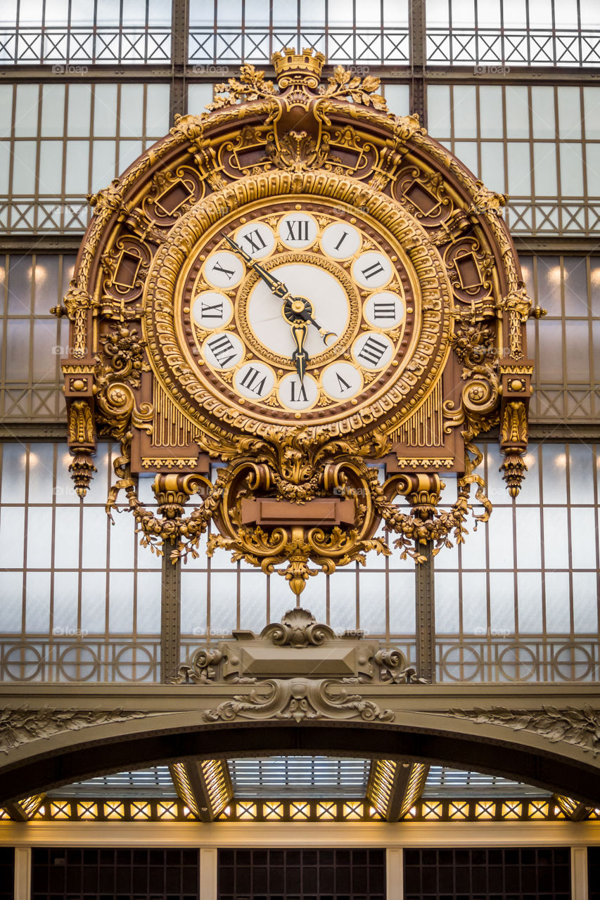 Gold clock of the Orsay museum in Paris 
