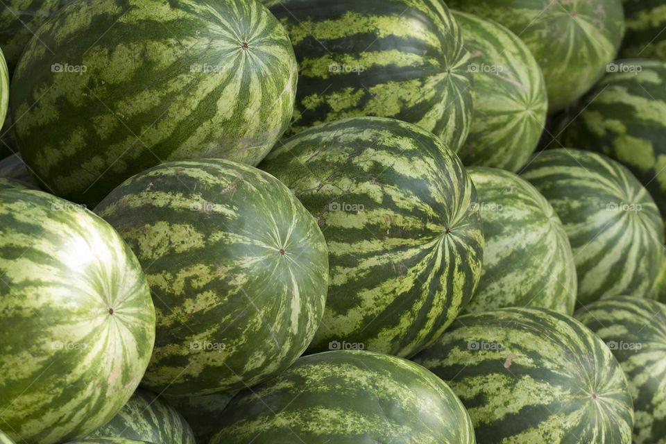 Stacked watermelons close up view