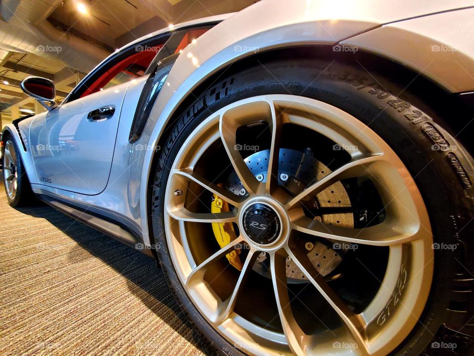 The voluptuous flank of a Porsche GT2RS is a sexy example of fine automotive art