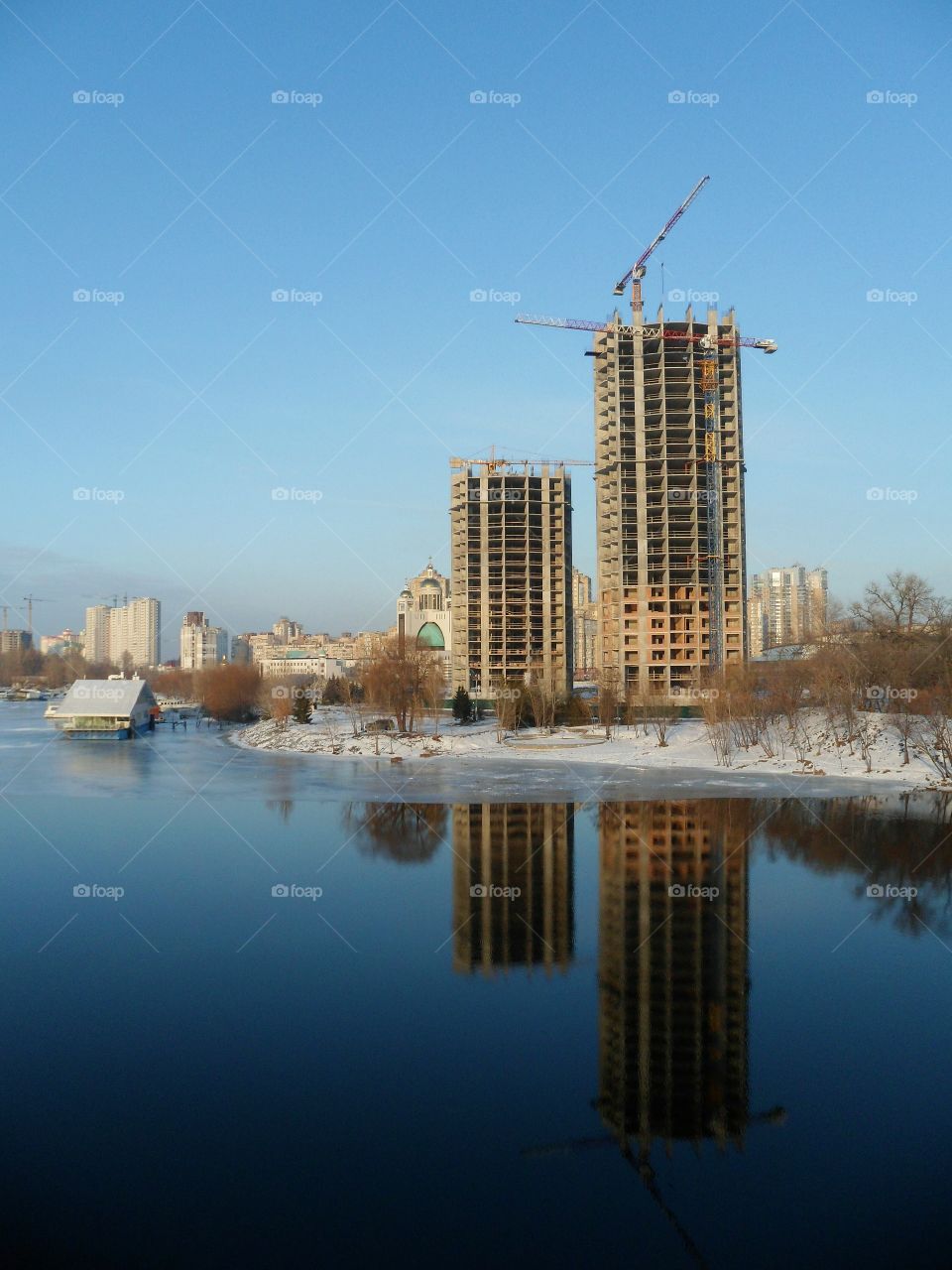 an incredible reflection of buildings in the river Dnepr