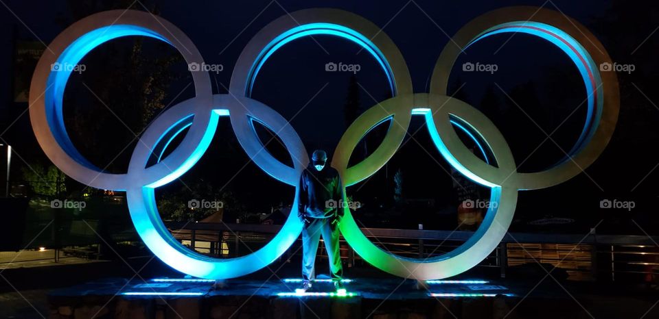 glowing circle light with man