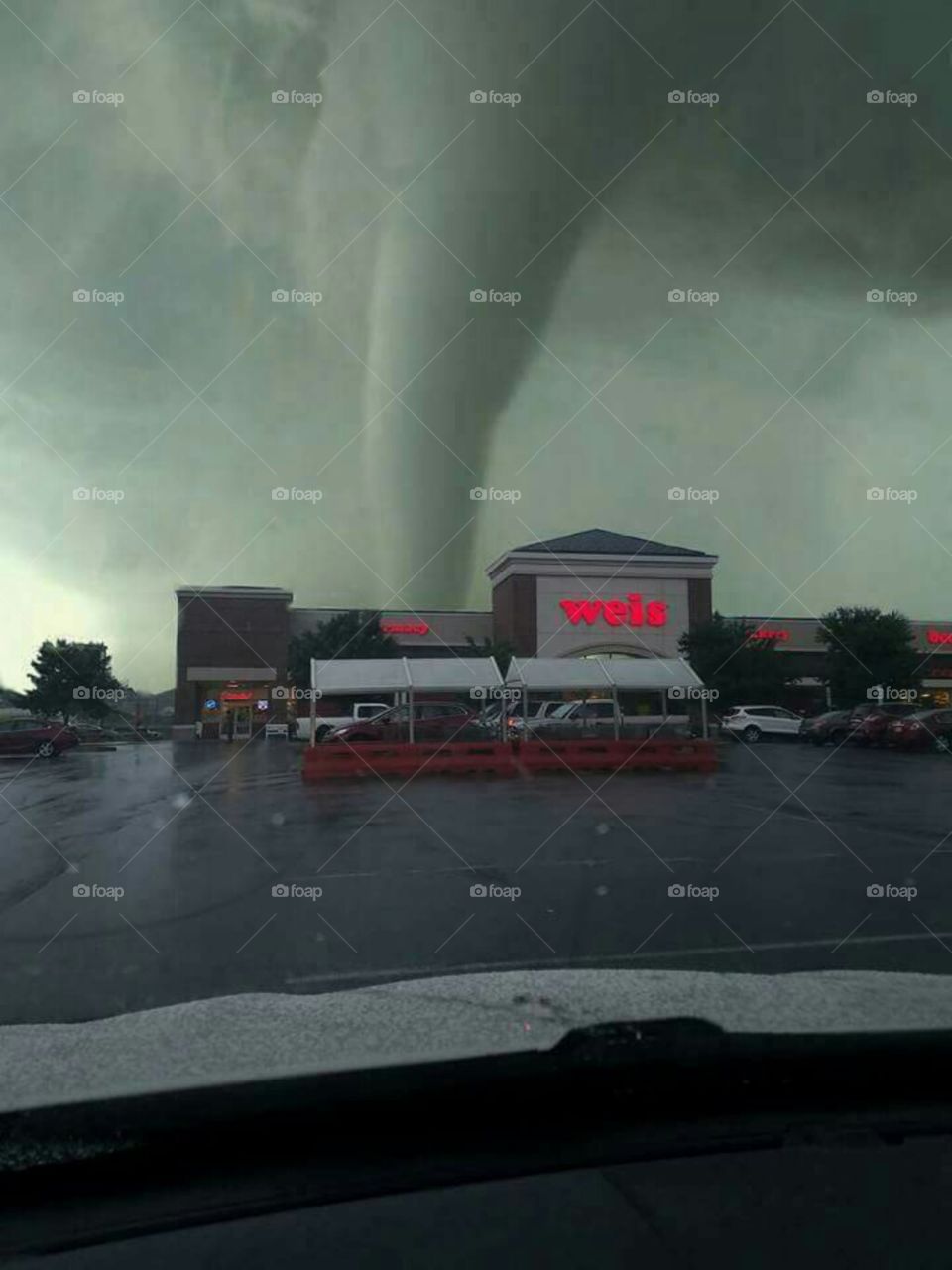 Crazy Funnel Cloud behind Grocery Store
